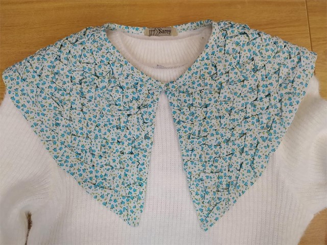 CUELLO CAPRI